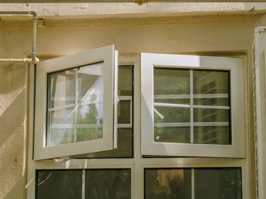 uPVC casement window with glazing bars fitted on a building exterior